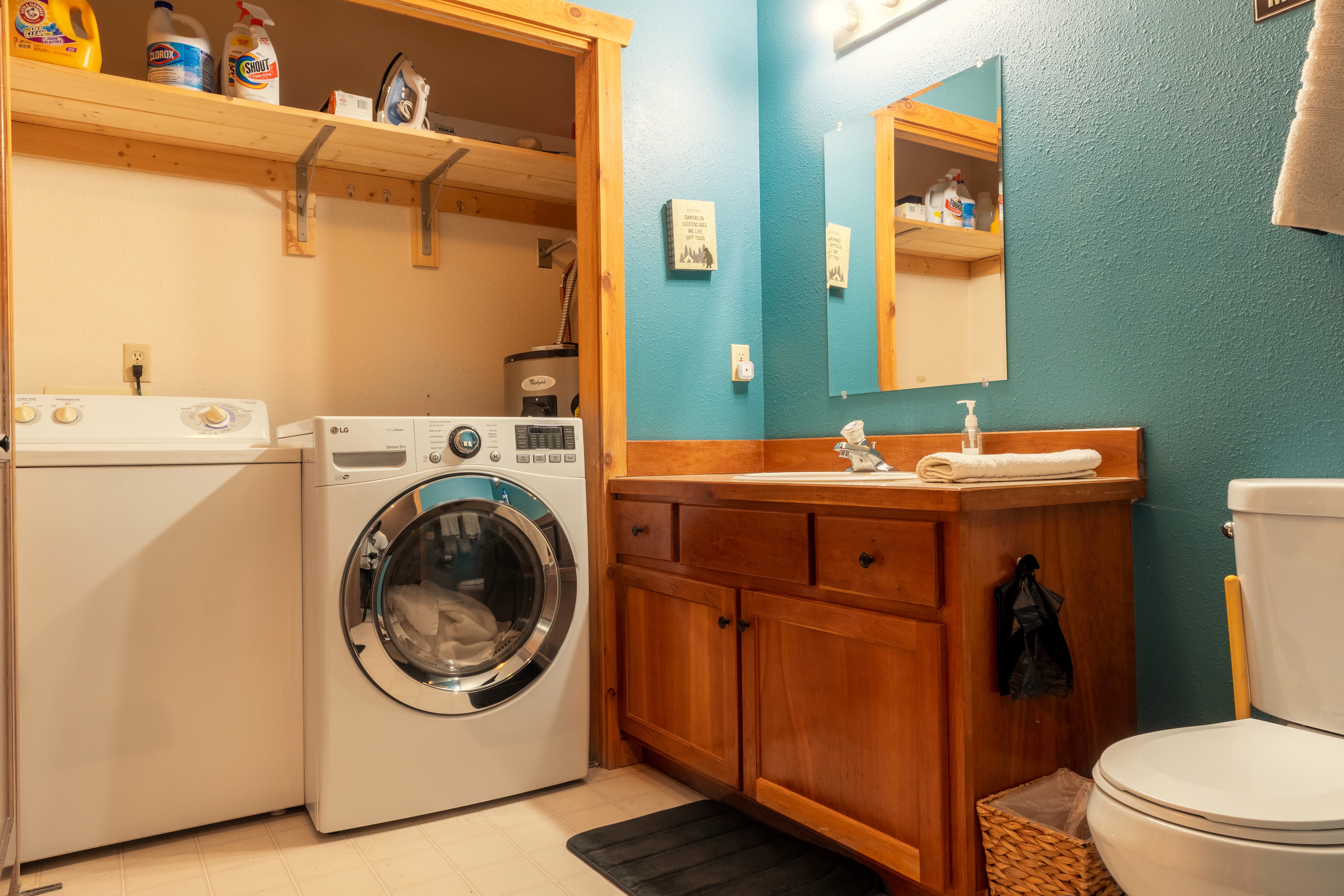 Shared bathroom with washer/dryer